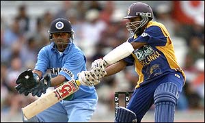 Jayawardene cuts a delivery from Anil Kumble