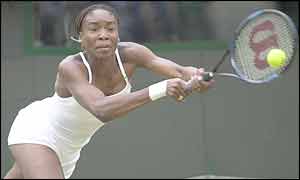 Venus Williams defends her serve with an impressive forehand