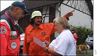 Police show map to local resident