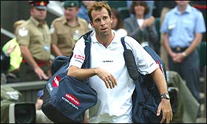 Greg Rusedski leaves Centre Court for the last time at Wimbledon this year