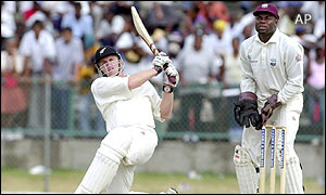 Scott Styris of New Zealand hits a six off the bowling of Ramnaresh Sarwan 