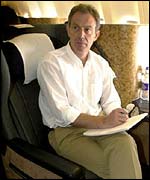 PM Tony Blair flying