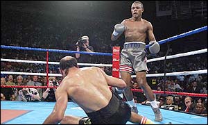 Hacine Cherifi hits the floor after a right hand from Felix Trinidad