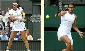 Despite playing with a heavily strapped thigh Mauresmo made all the moves before the rain break