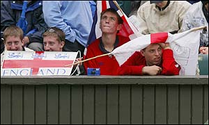 British tennis fans wait for Tim Henman to emerge on Centre Court 