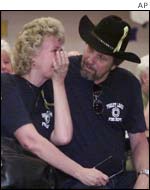 Evacuees from the Rodeo fire react to the news