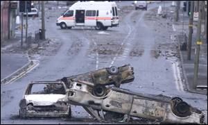 Burnt-out cars on the streets of Bradford in July 2001