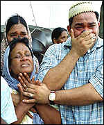 Weeping relatives after the airport attack