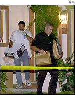 FBI agents at suspect's house
