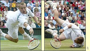 Lleyton Hewitt dives at the net during the third set