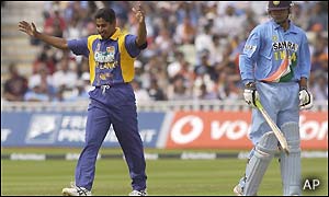 Chiminda Vaas of Sri Lanka celebrates the wicket of Dinesh Mogia of India which left India on 30-2