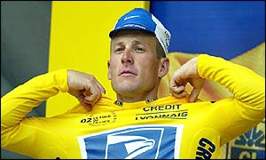 America's Lance Armstrong wears the yellow jersey after posting the quickest tim in the time trial in Luxembourg