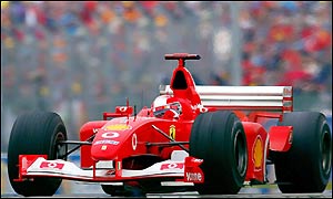 Michael Schumacher overtakes Montoya's Williams on lap 16 and his Ferrari is never troubled as he takes only his second British Grand Prix