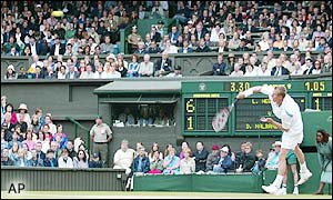 Hewitt's serve is thunderous, forcing errors from Nalbandian