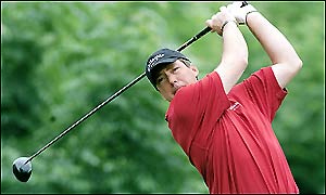 Britain's Barry Lane starts his fourth round five under but quickly falls behind