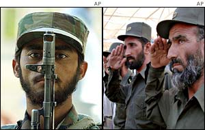 Soldiers stand to attention and salute Qadir's coffin
