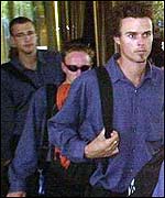 New Zealand's players head for the airport following the explosion