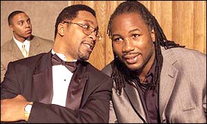Lennox Lewis with Michael Watson at his testimonial