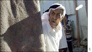 Bride's father checks for Israeli army patrols