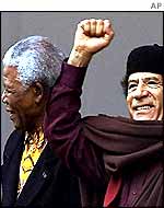 Nelson Mandela and Libya's Muammar Gaddafi 