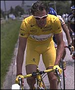 Cipollini in yellow jersey, shorts and bike
