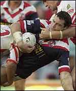 Adrian Morley is tackled by the St George Illawarra defence