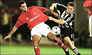 Chris Barker (left) tangles with Newcastle's Craig Bellamy