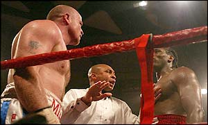Audley HArrison (right) and Dominic Negus are separated by the referee during their hot-tempered clash