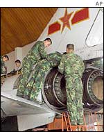 Chinese mechanics at a military base outside Beijing