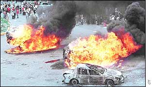 Cars burn during protest