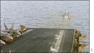 An F-18 takes off from a US aircraft carrier
