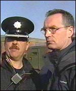 Gerry Kelly of Sinn Fein and police Supt David Boultwood