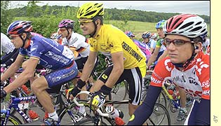 Spain's Igor Gonzalez Galdeano wearing the overall leaders yellow jersey starts the stage within the pack