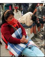 Woman sleeping next to her machete