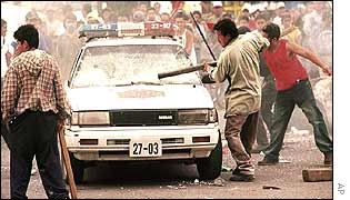 Farmers attack police car