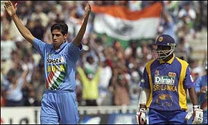 India's Ashish Nehra takes a wicket