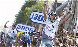 Francais des jeux rider Bradley McGee powers through to win stage seven