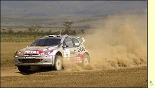 World Rally Championship leader Marcus Gronholm creates a cloud of dust during Thursdaay's special stage