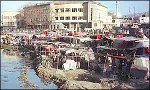 Shanty town beside the Kabul river