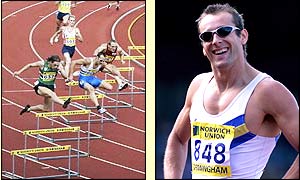 Chris Rawlinson from Trafford Athletics Club smiles after winning the 400 metre hurdles