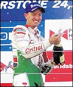Colin Edwards celebrates victory