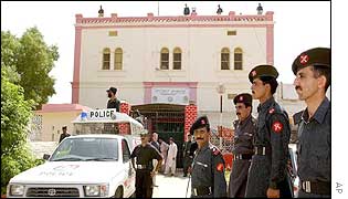 Police stand guard outside the jail in Hyderabad