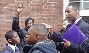 male teacher with pupils