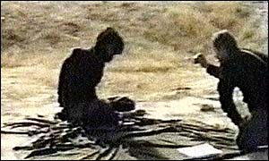 Footage of John Walker Lindh being interrogated by a CIA agent in Afghanistan