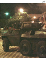 An armoured car driven by rebel soldiers in Asuncion