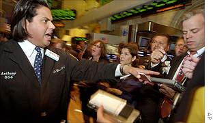 Volatility took hold of Wall Street again Tuesday, with stocks falling sharply despite a favourable round of second-quarter earnings reports