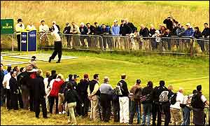 Tiger Woods tees off at the 18th during practice