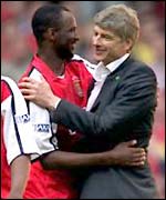 Arsene Wenger, right, with midfielder Patrick Vieira