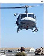 Spanish helicopter takes off from a frigate in Ceuta