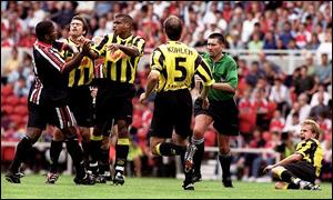 Sunday Oliseh in a dispute with a player from English club Middlesbrough